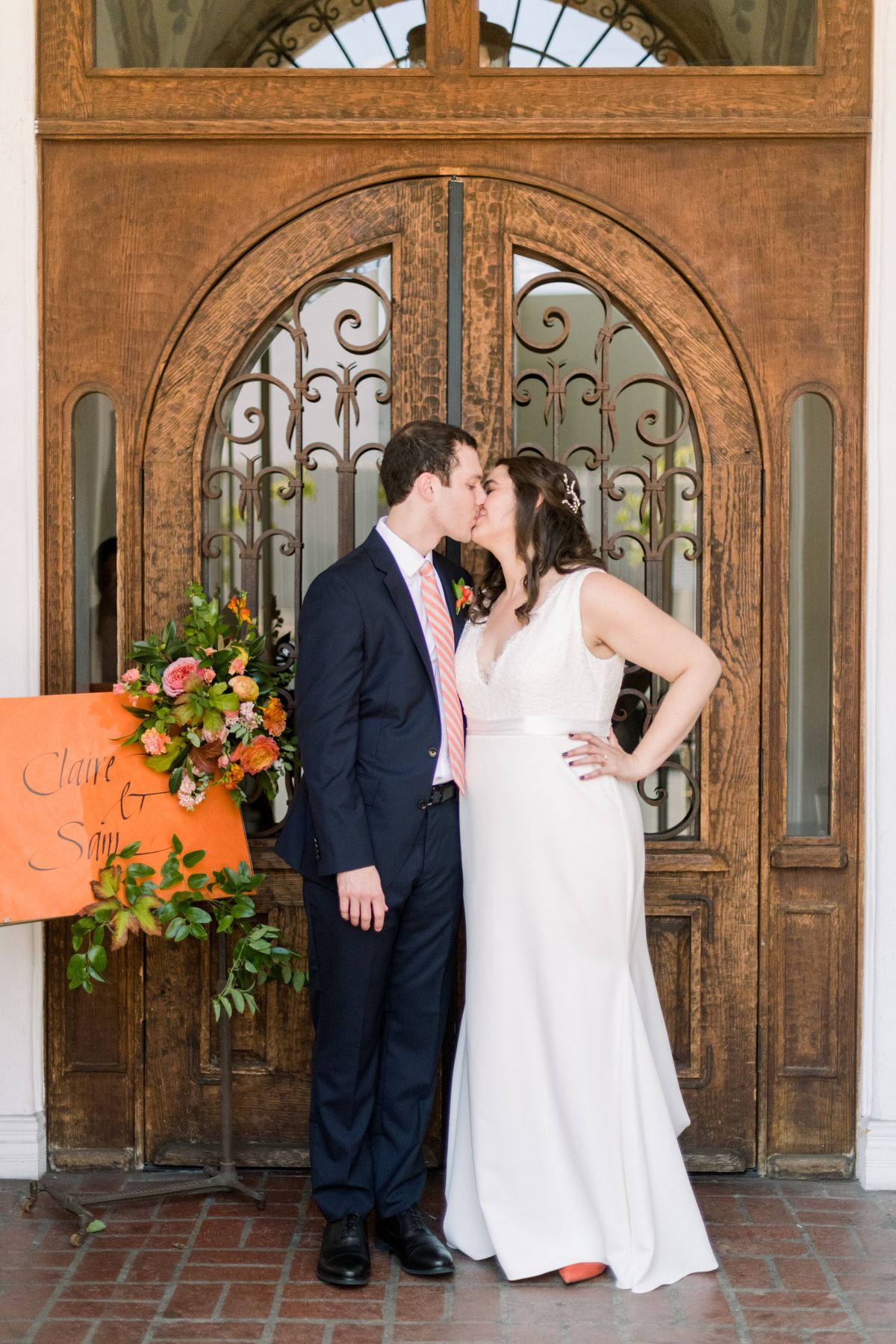 bride and groom portraits in front of 1920's venue, the carondelet house