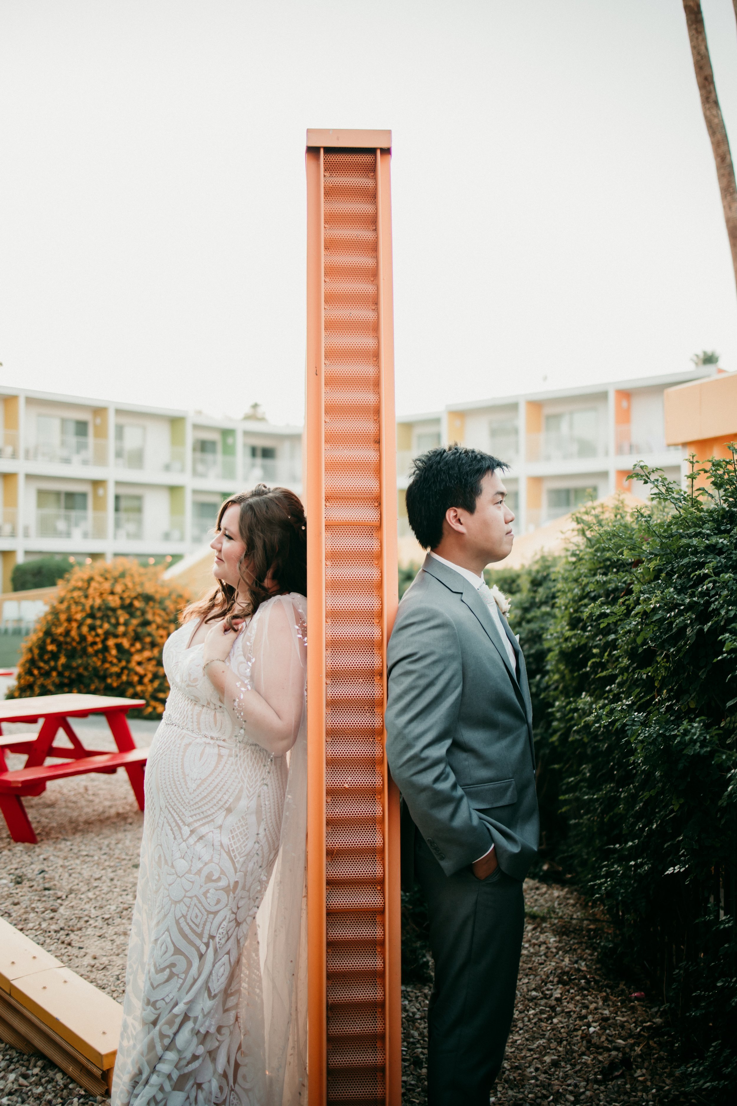Bride, groom, and all their wedding guests jump into the hotel pool after the reception... Epic Palm Springs wedding at The Saguaro