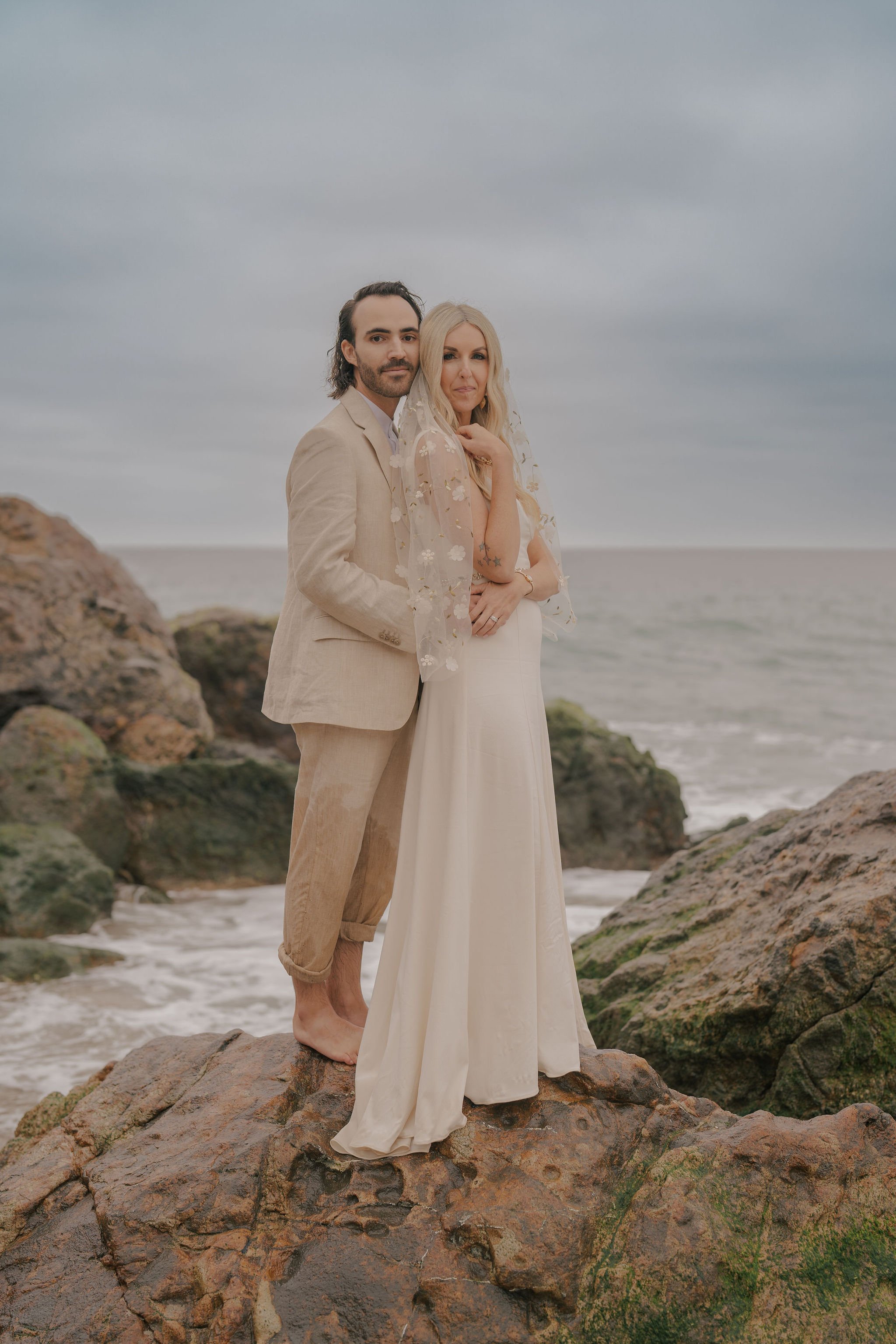 Manifestation coach, founder, and podcast host, Andi, plans intentional and intimate wedding in Malibu, CA