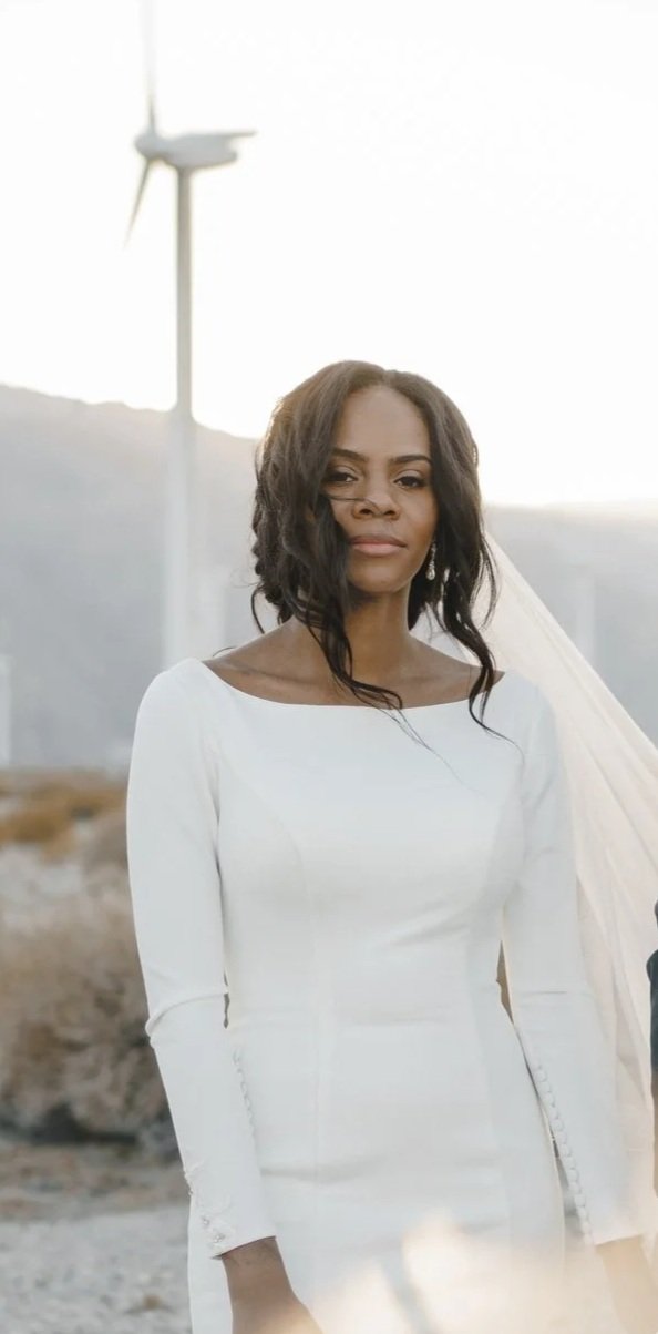 bride with glowing airbrush makeup and loose, romantic hairstyle for palm springs elopement